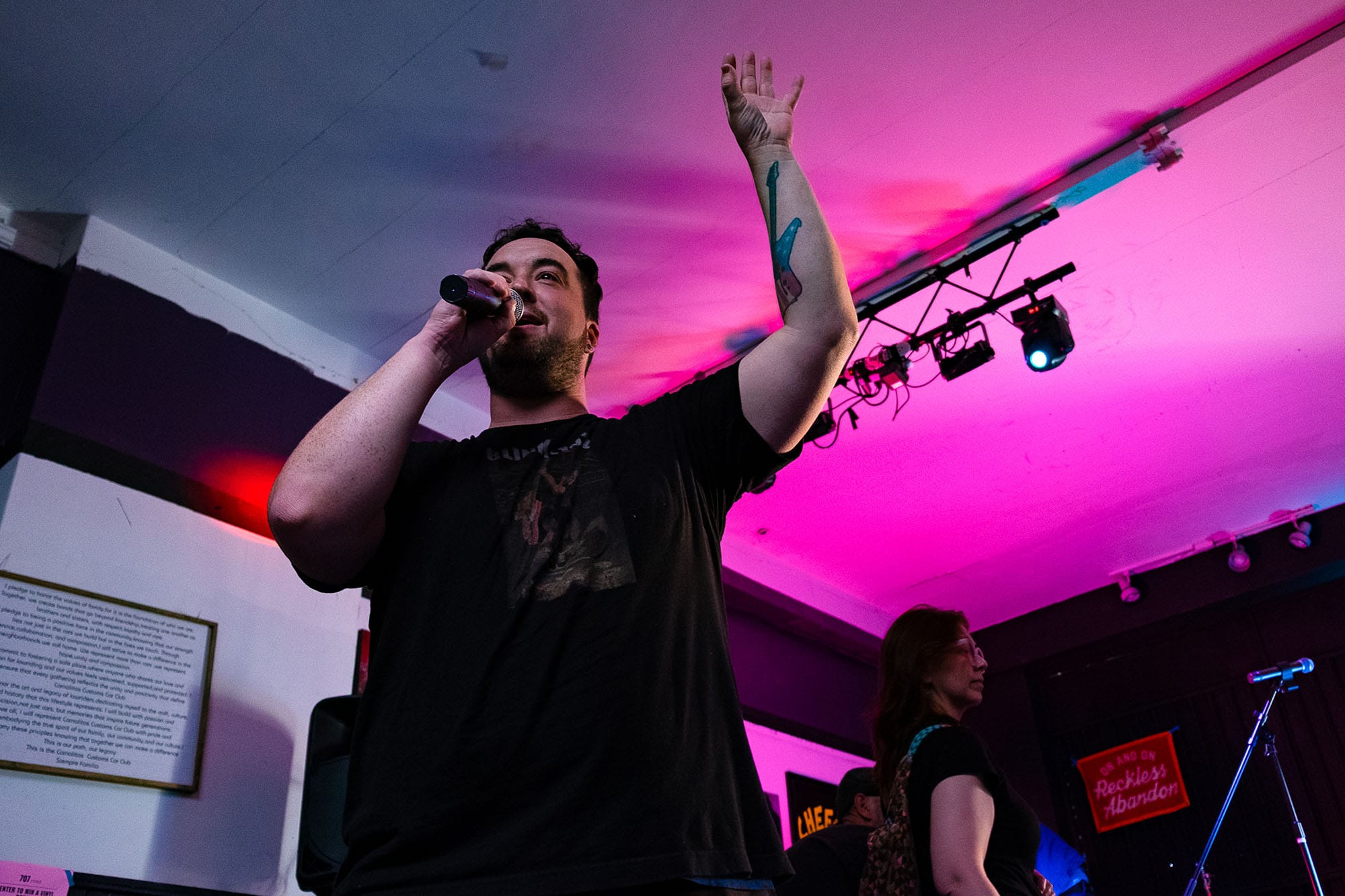 707 Punk founder Sam Houston speaks at the first show at Carnalitos Customs on Friday