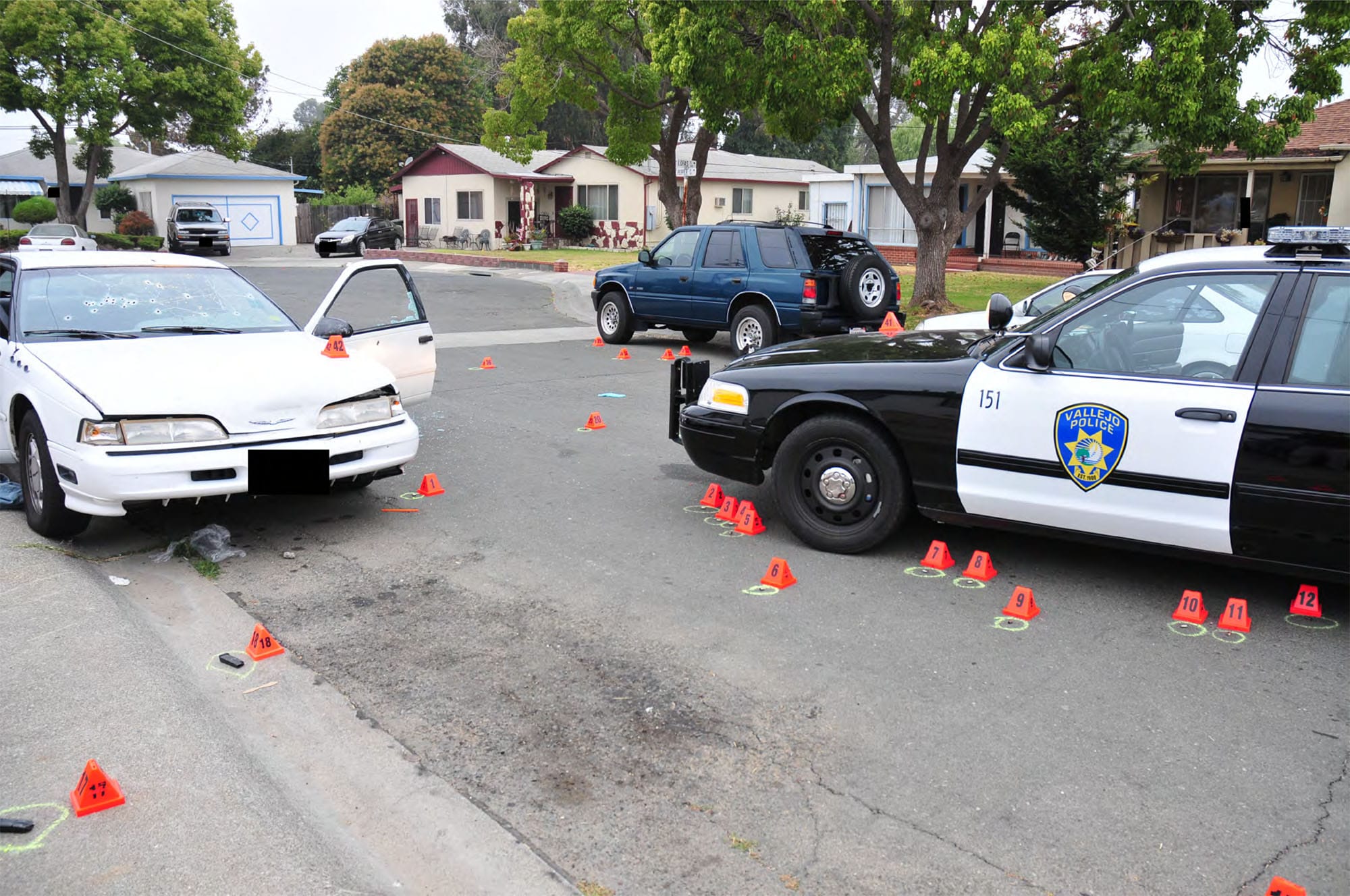 Evidence placards left at the scene of the 2012 Vallejo police shooting of Mario Romero. 