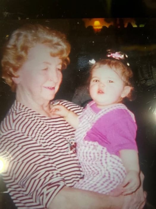 Cici Corsetti in the arms of her great grandmother in an undated photograph.