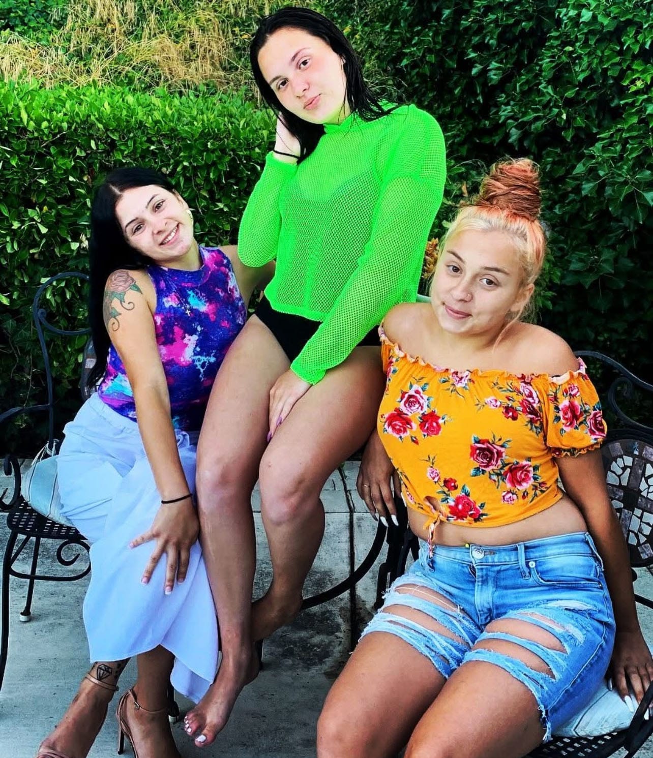Cici Corsetti, left, and her two sisters in 2019. 