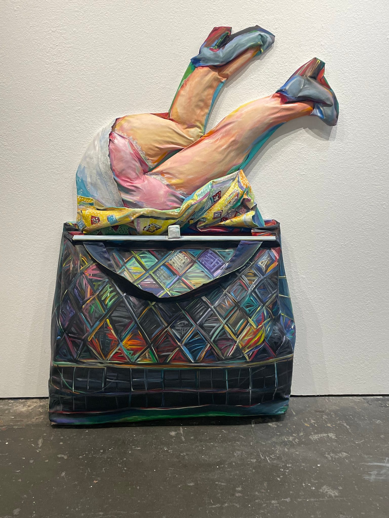 Krevsky said she has a bit of a fetish with women's purses. Purses for her symbolize a woman’s identity and also her objectification, parallel to the objectification of art.