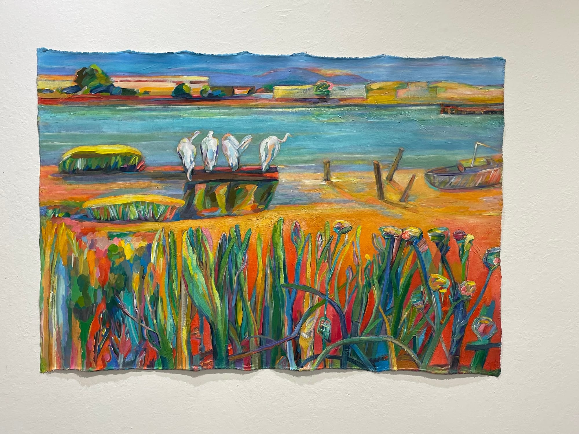 The scalloped borders of an unframed and unstretched painting by Diana Krevsky.