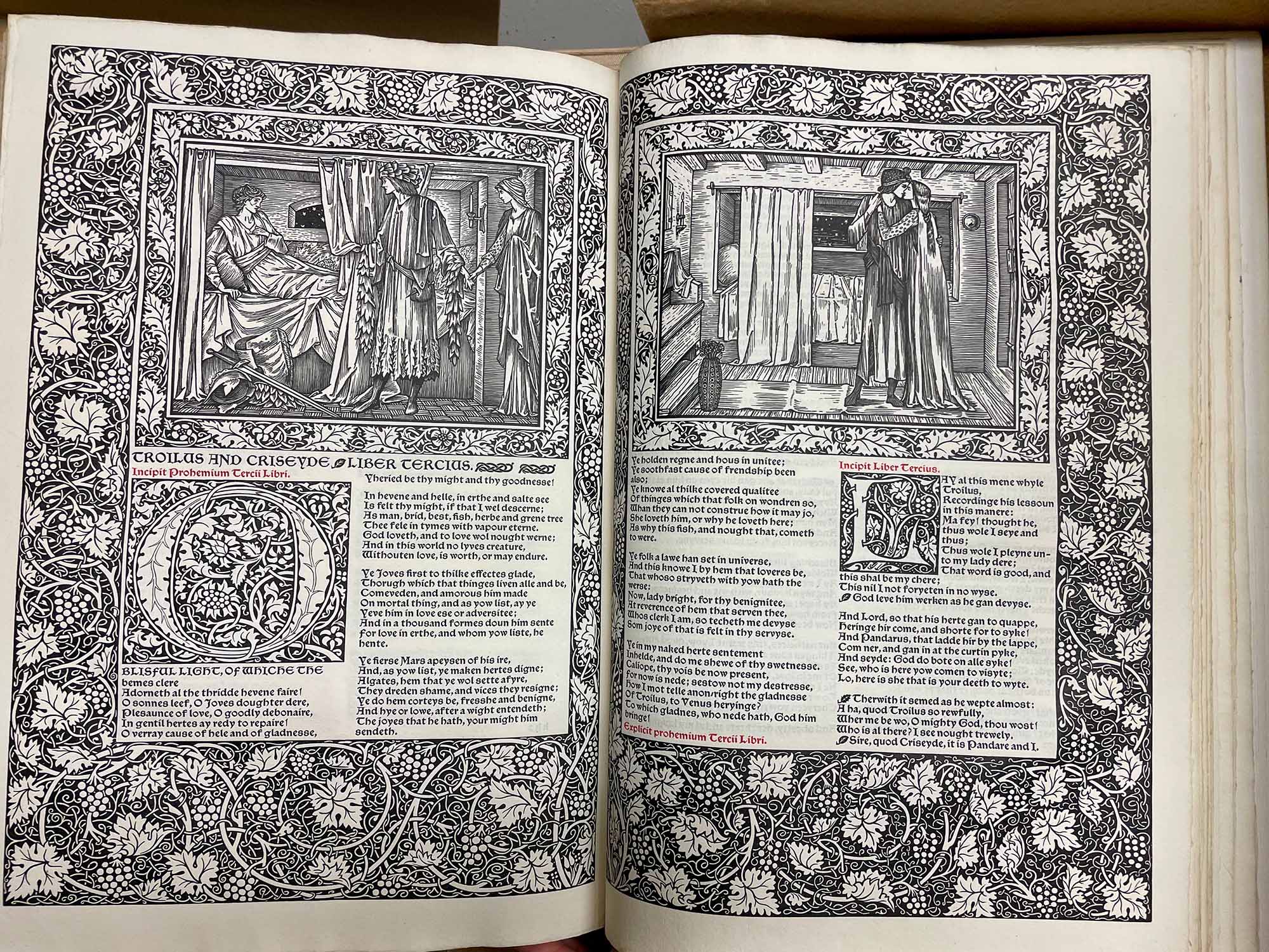 Two pages of the Kelmott Chaucer. The book is over 16 inches long and 12 inches wide. 
