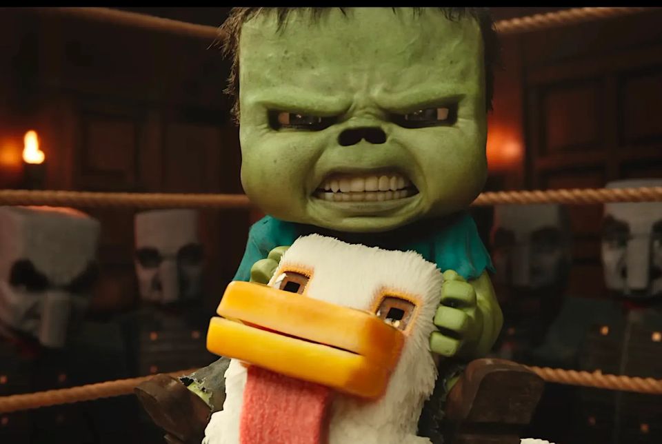 A blocky, green-skinned, child grimaces atop a similarly blocky chicken within a boxing ring, rendered in extreme detail. 