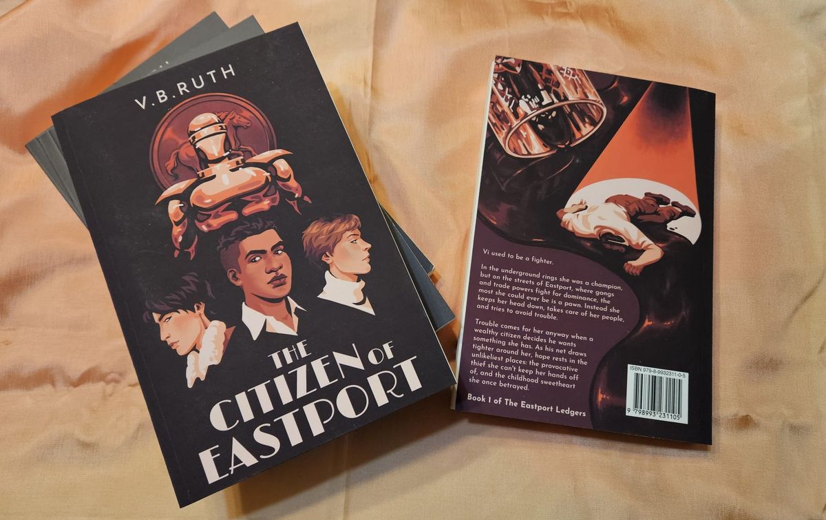 Stacked paper copies of The Citizen of Eastport, showing front and back covers