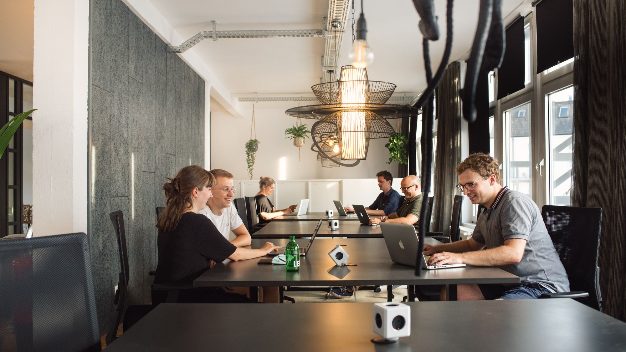 People inside the coworking space DIE DIELE having fun and working