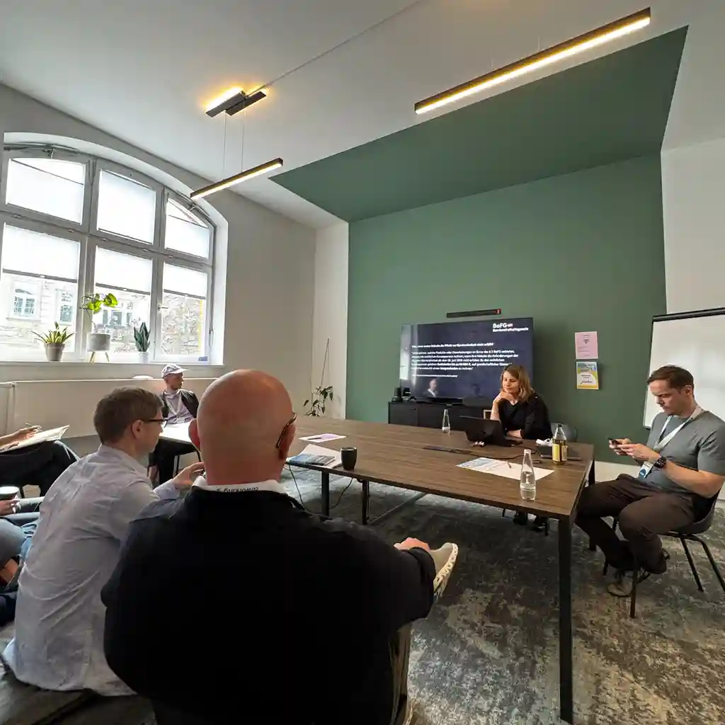 People sitting on a table and presenting ideas.