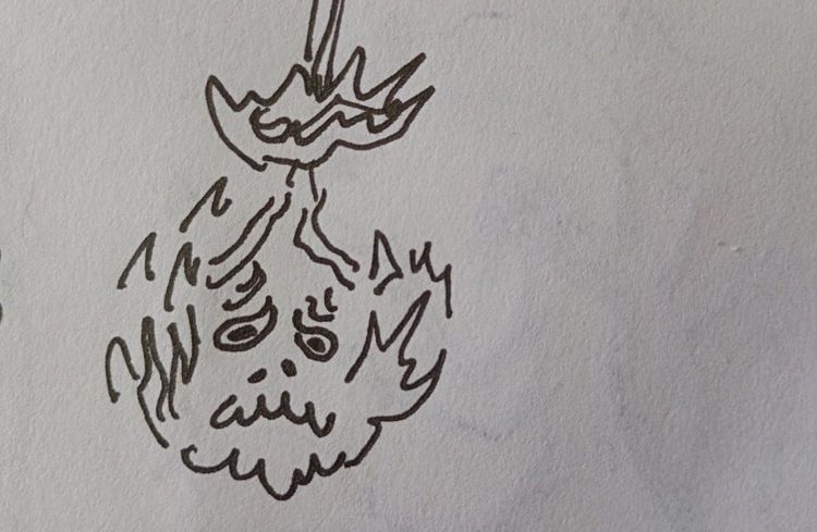 una cara en llamas. a face in flames.