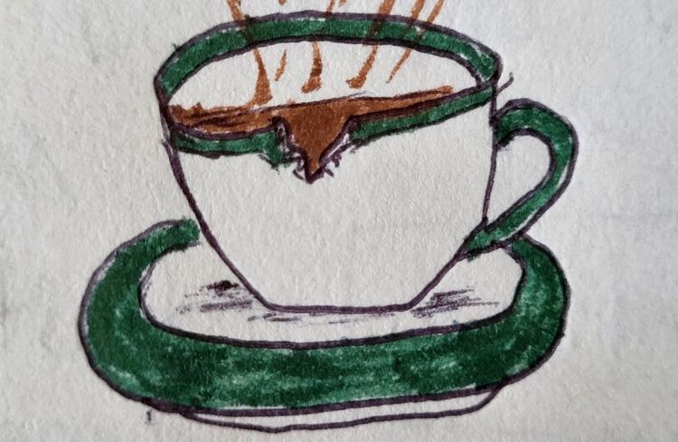 Una taza de cafe con una grieta. A coffeecup with a crack.