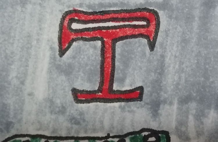 una T roja con serifa. a red T with serif.