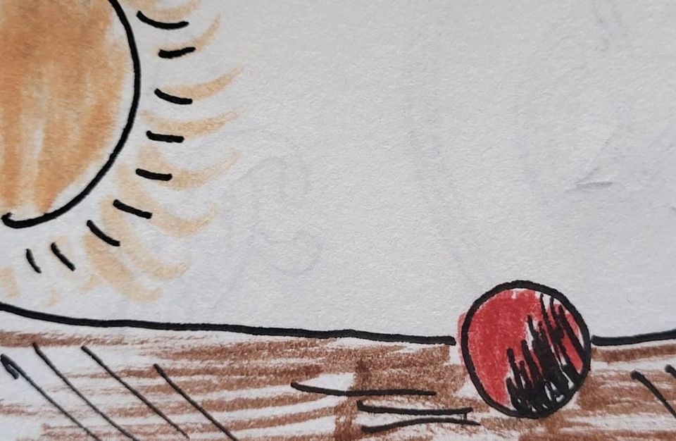 pelota roja en el sol. red ball in the sun.