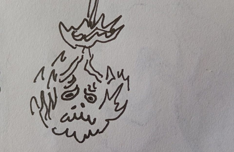 una cara en llamas. a face in flames.