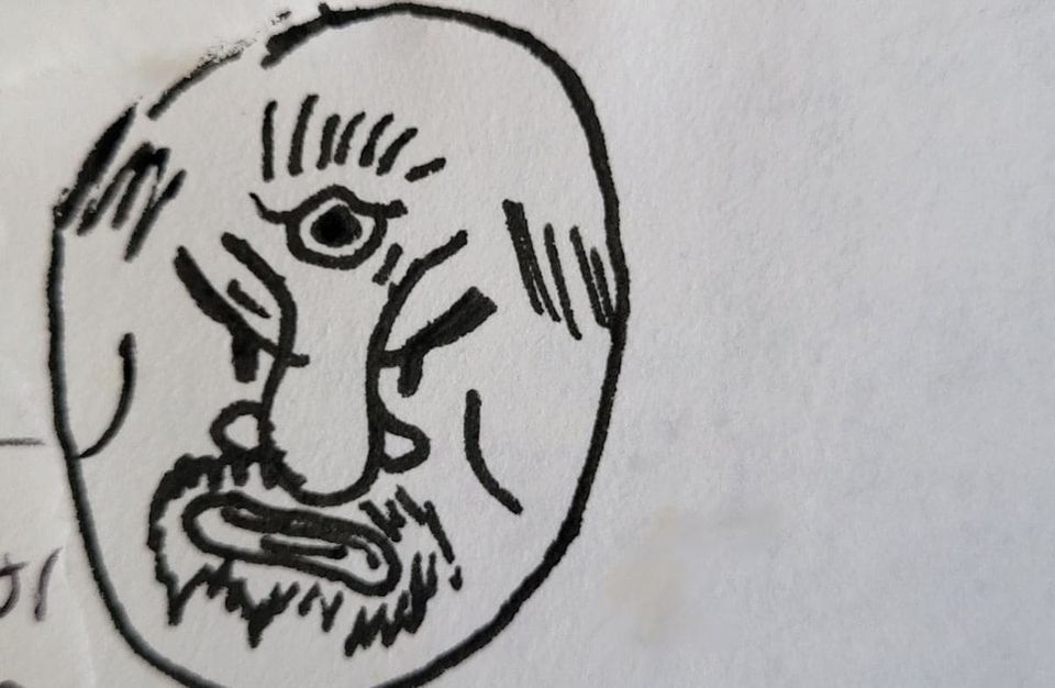 un demonio con un tercer ojo en el frente. a demon with a third eye in the forehead.