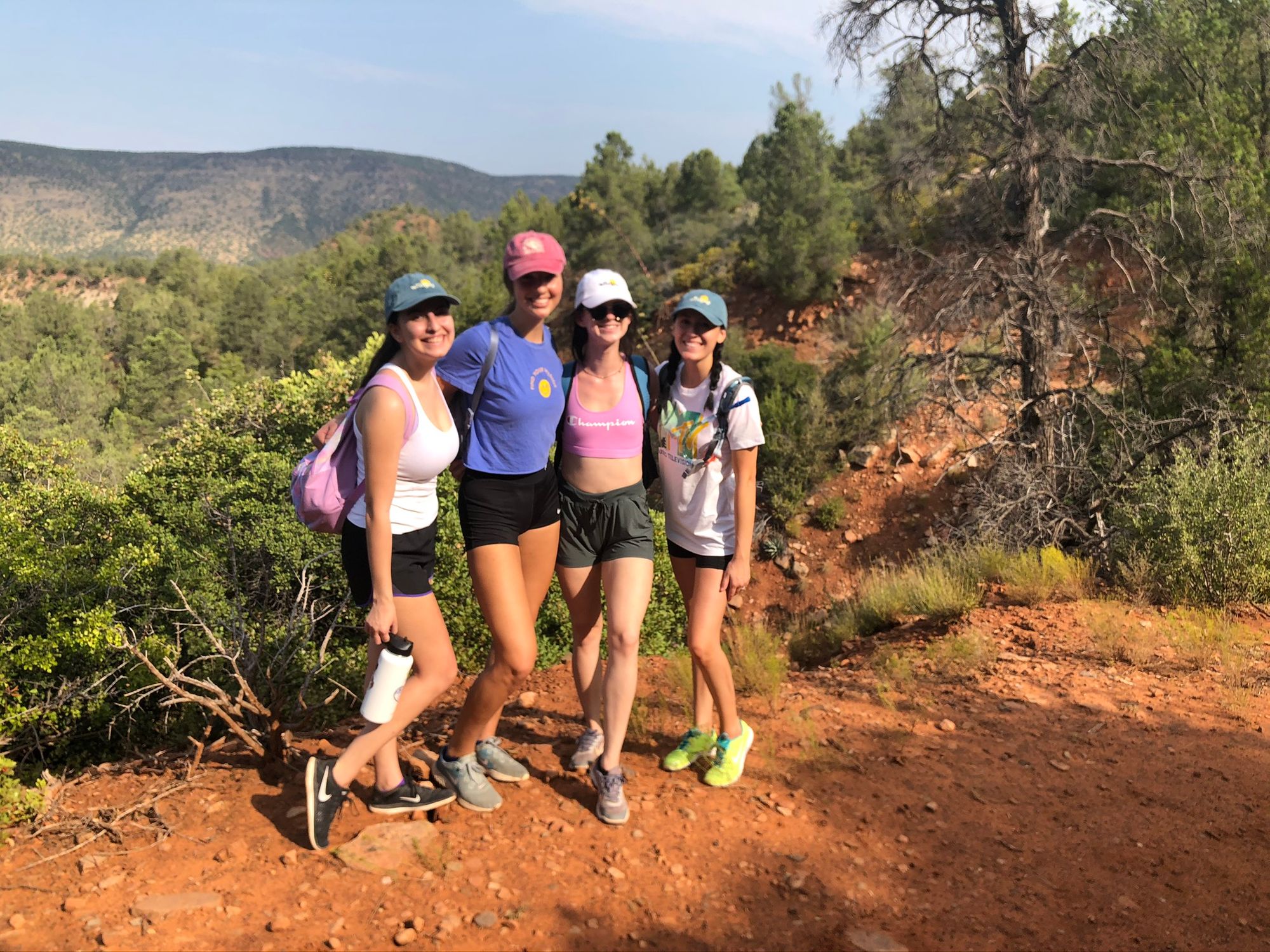 Girls posing at Bob Bear Trailhead at Fossil Springs 