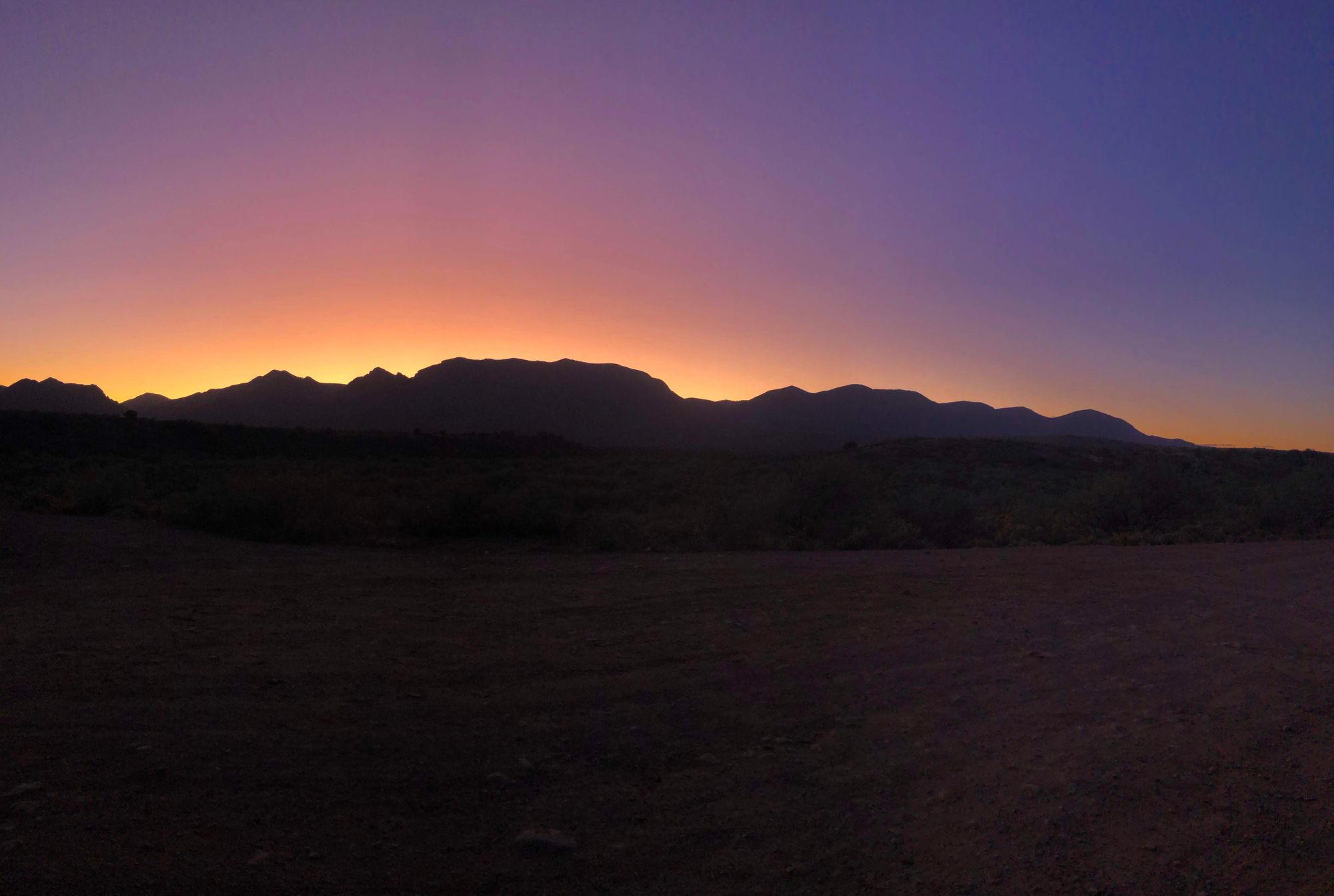 Purple, Yellow, Dark Purple, Orange Dirt Road Sunset in Arizona Tonto National Forest 