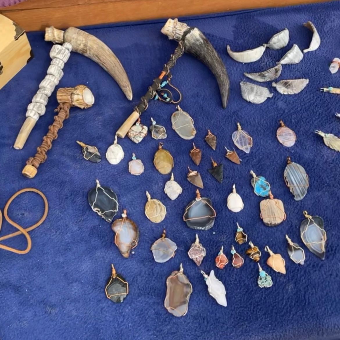 Hand crafted art on a blue display at Cool Springs Station, Kingman, Arizona