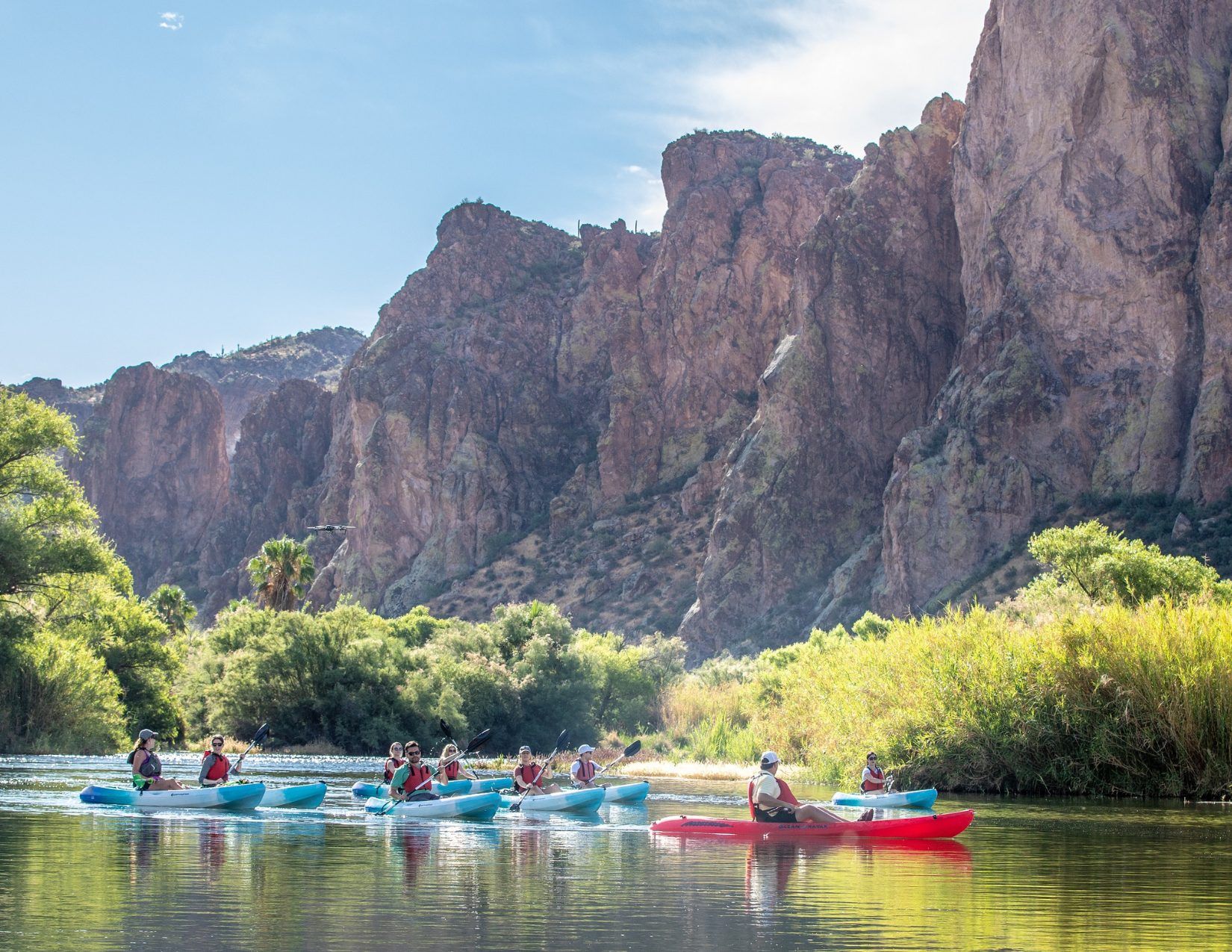 group of people paddleboarding on the Salt River in Mesa Arizona