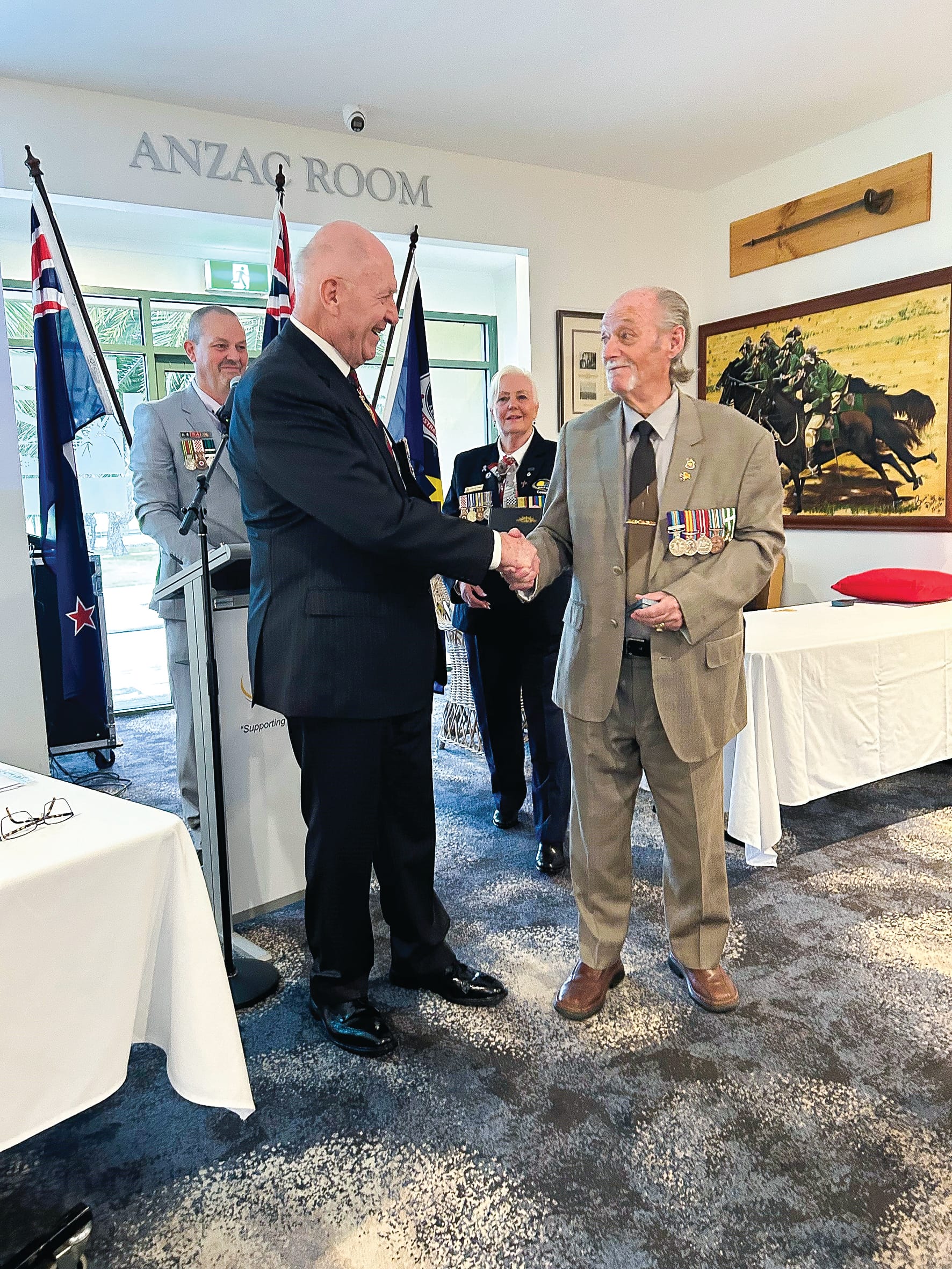 Medal investiture by Sir Peter Cosgrove at RSL