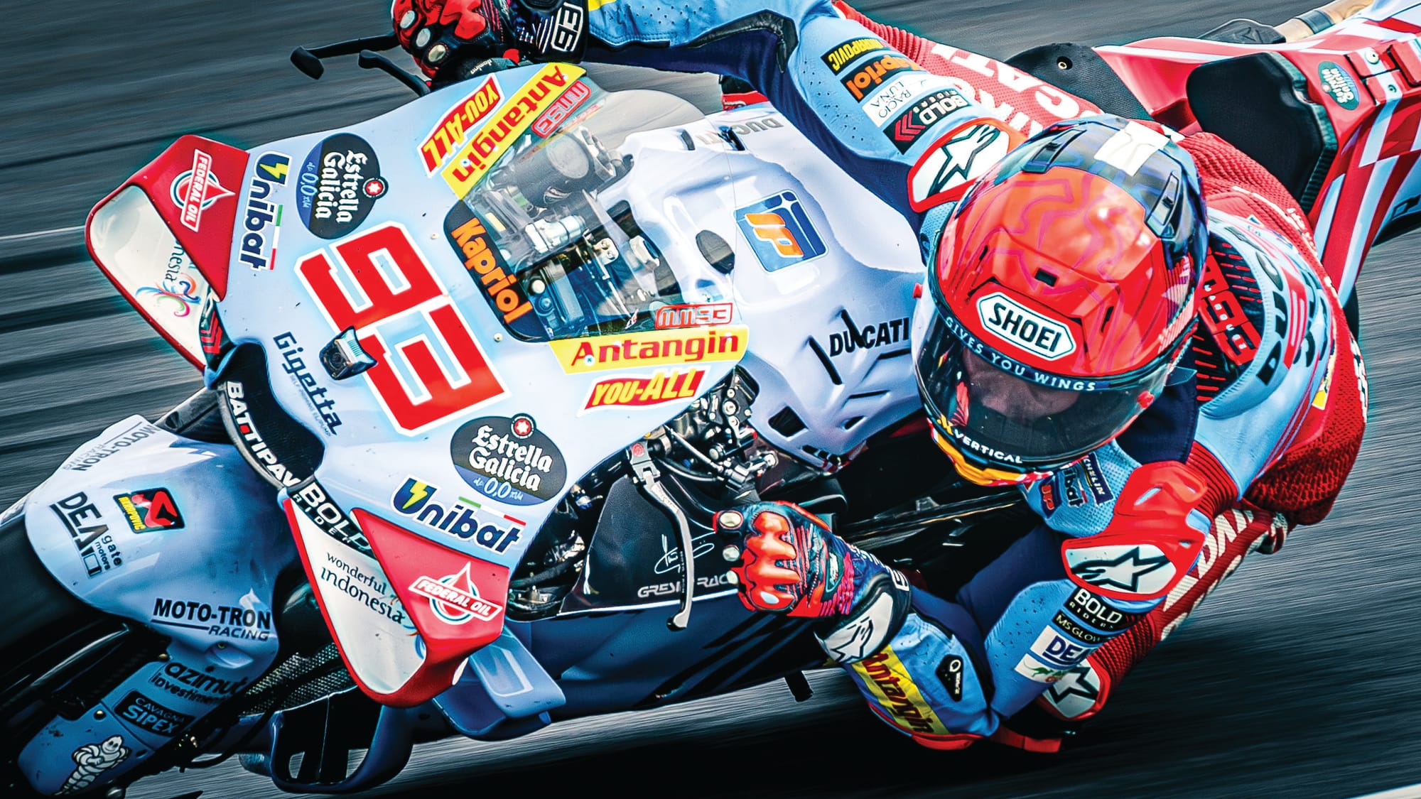 Marquez victorious in cat-and-mouse battle