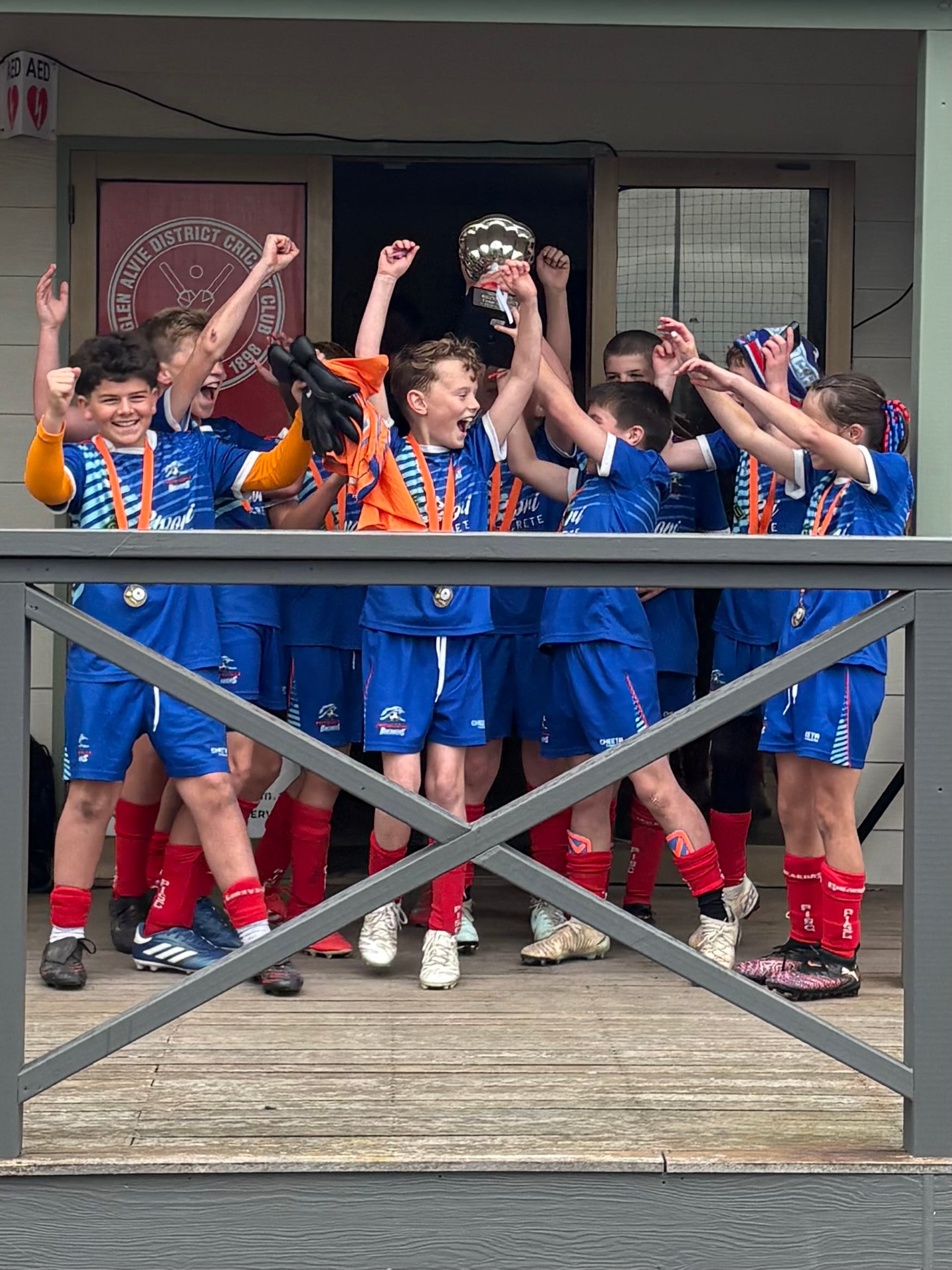 U12A soccer teams celebrate their win.