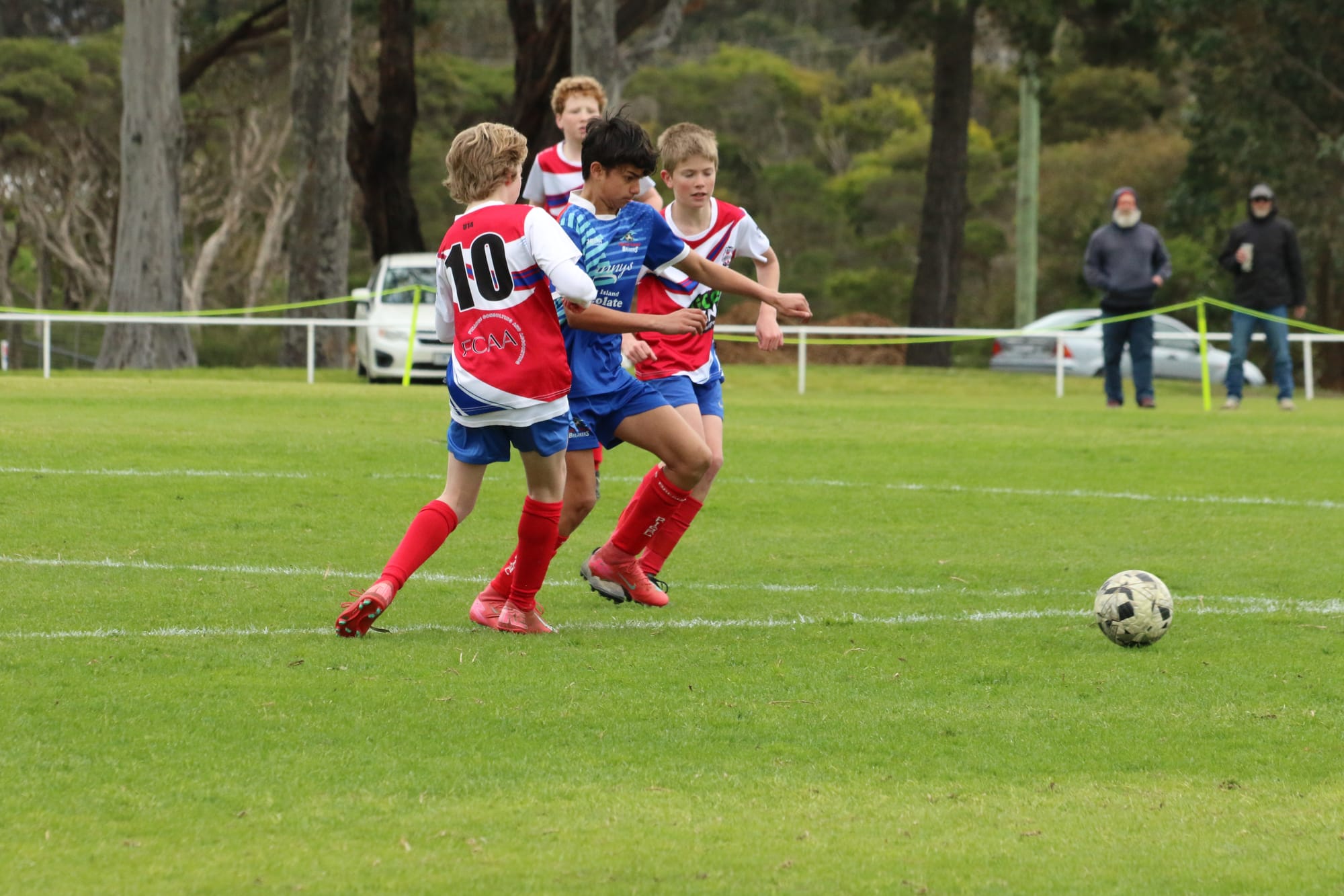 Blake Lewindon pushing forward in the U14 Mixed Grand Final.