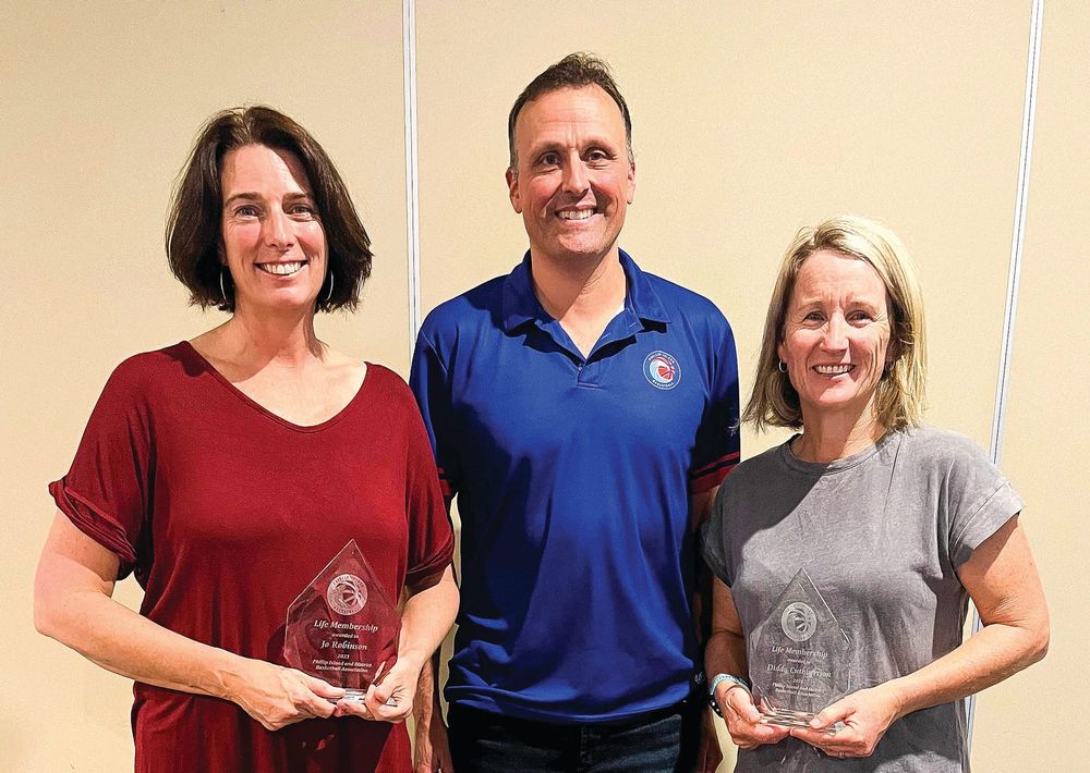 Two new life members for basketball club post image