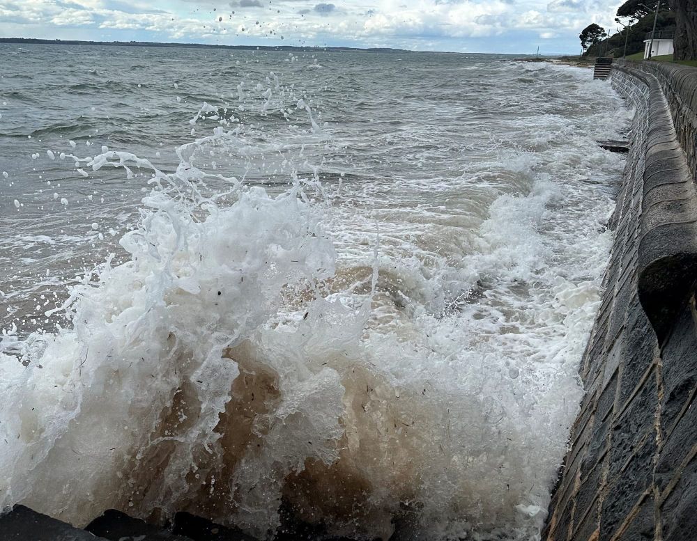 Tide, wind combine damaging post image