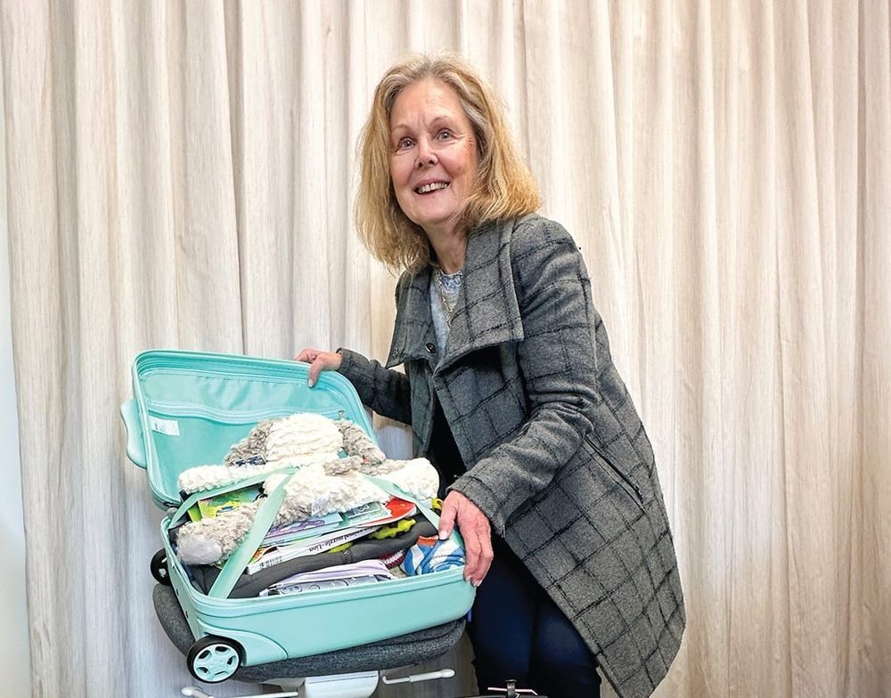 Suitcases overflowing with care post image