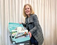 Suitcases overflowing with care post image