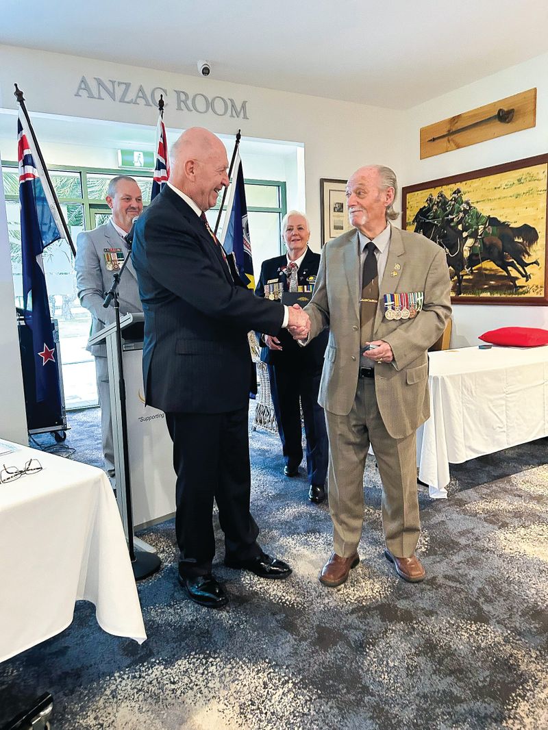 Medal investiture by Sir Peter Cosgrove at RSL post image