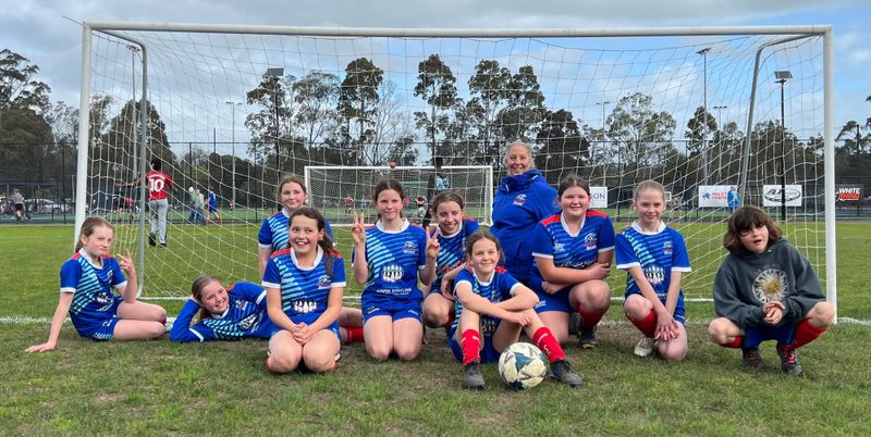 Breakers U12 Girls celebrate nail-biting win. post image