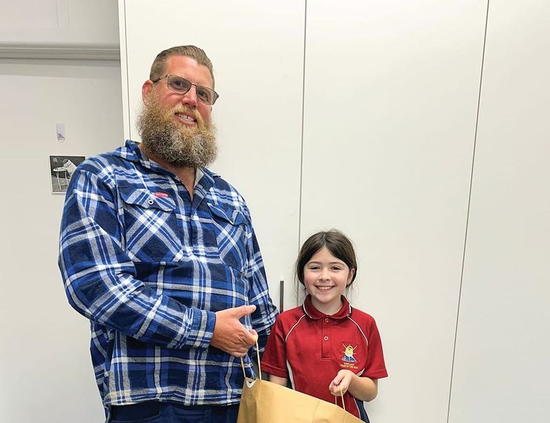 A very happy father post image