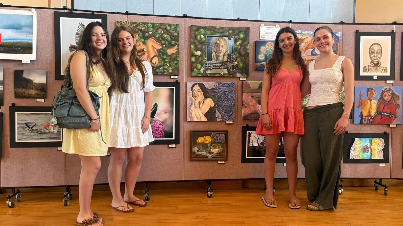 A student art show in Abbot Hall, arranged to grow up
