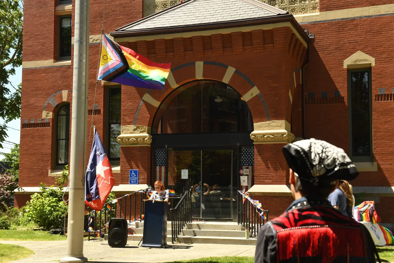 Pride flag rises over Abbot Hall as speakers urge joy in defiant moment