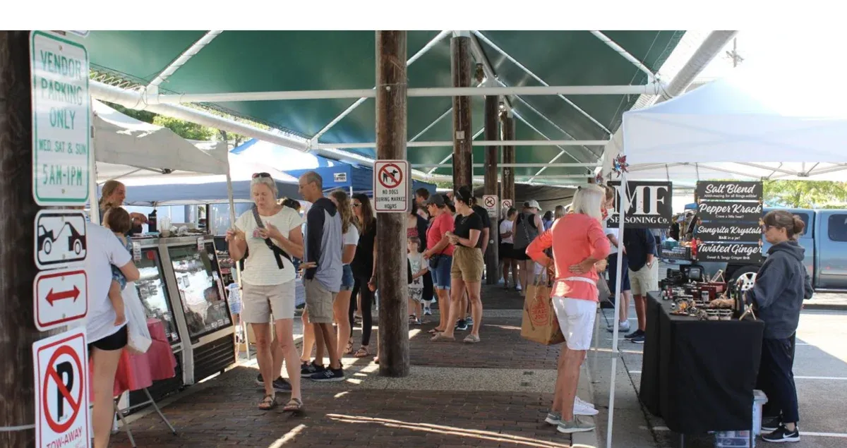 Work underway at Grand Haven charter fishing docks ahead of boating, fishing season