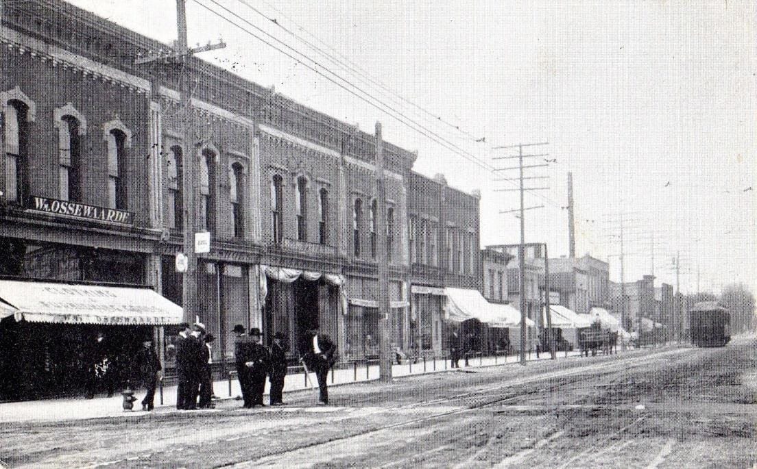 A group of people standing on the street
Description automatically generated with low confidence