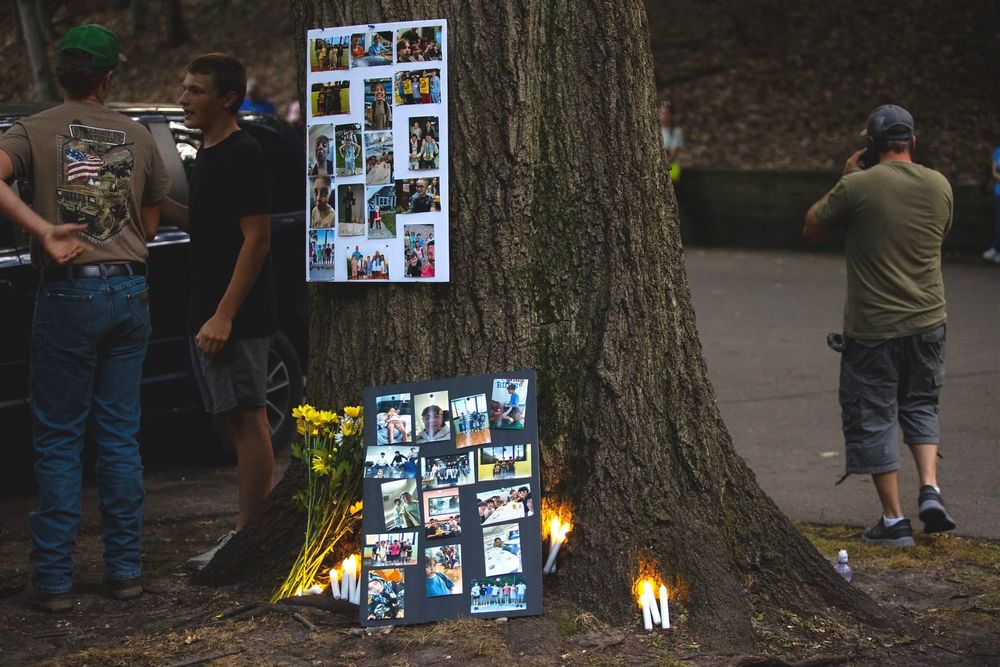 ‘This was dark, this was evil': Dozens attend vigil for loss of Grand Haven Twp. family post image