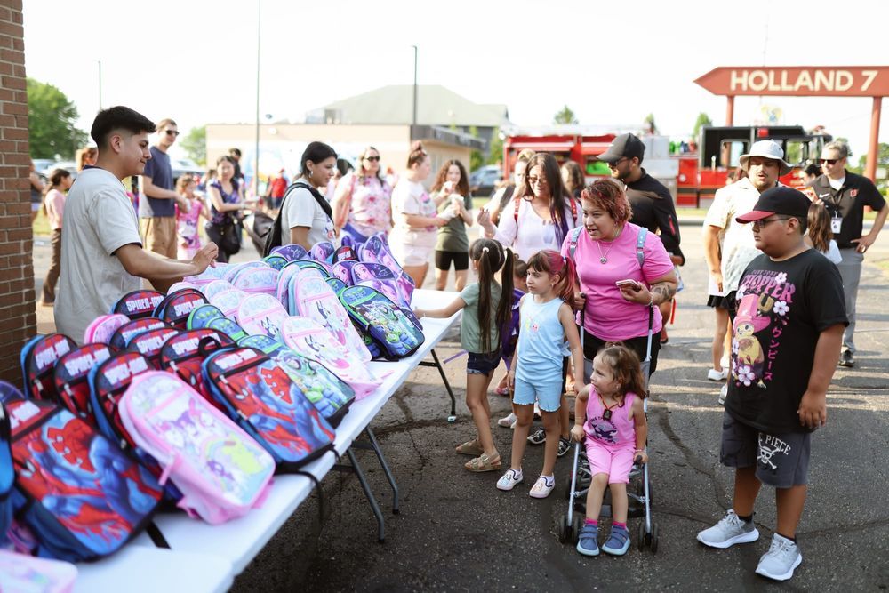 LAUP back-to-school event draws 1,500 residents, hands out over 900 backpacks in Holland post image