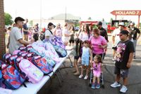 LAUP back-to-school event draws 1,500 residents, hands out over 900 backpacks in Holland post image
