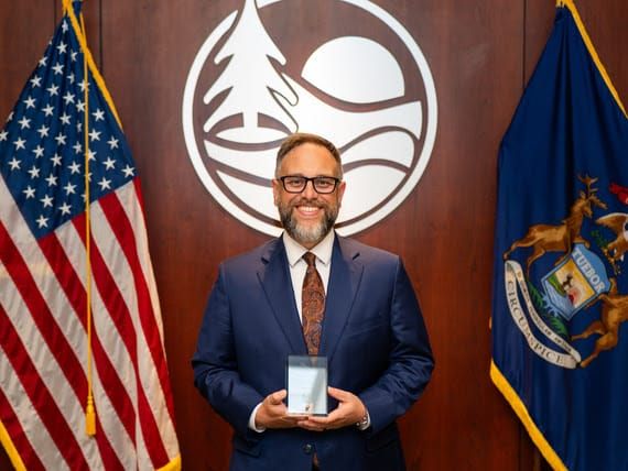 Ottawa County honors off-duty public defender staffer for helping distressed resident post image