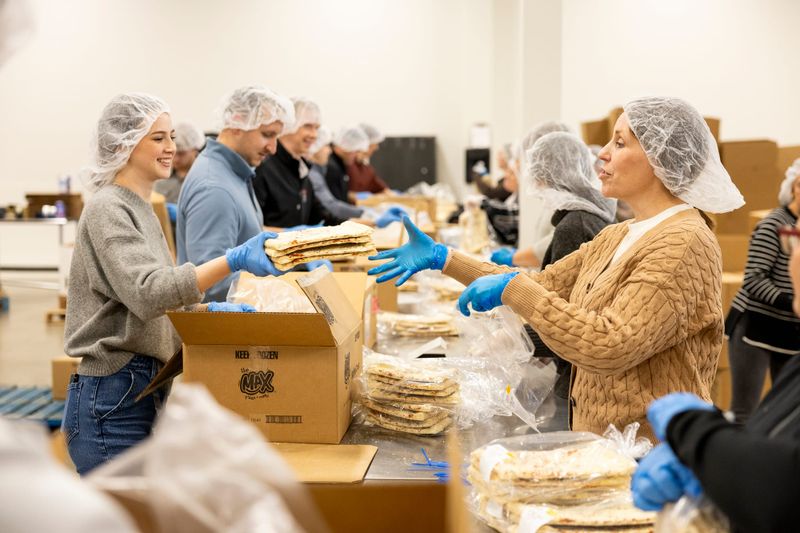 Feeding America West Michigan launches September volunteer drive to package 50,000 meals post image