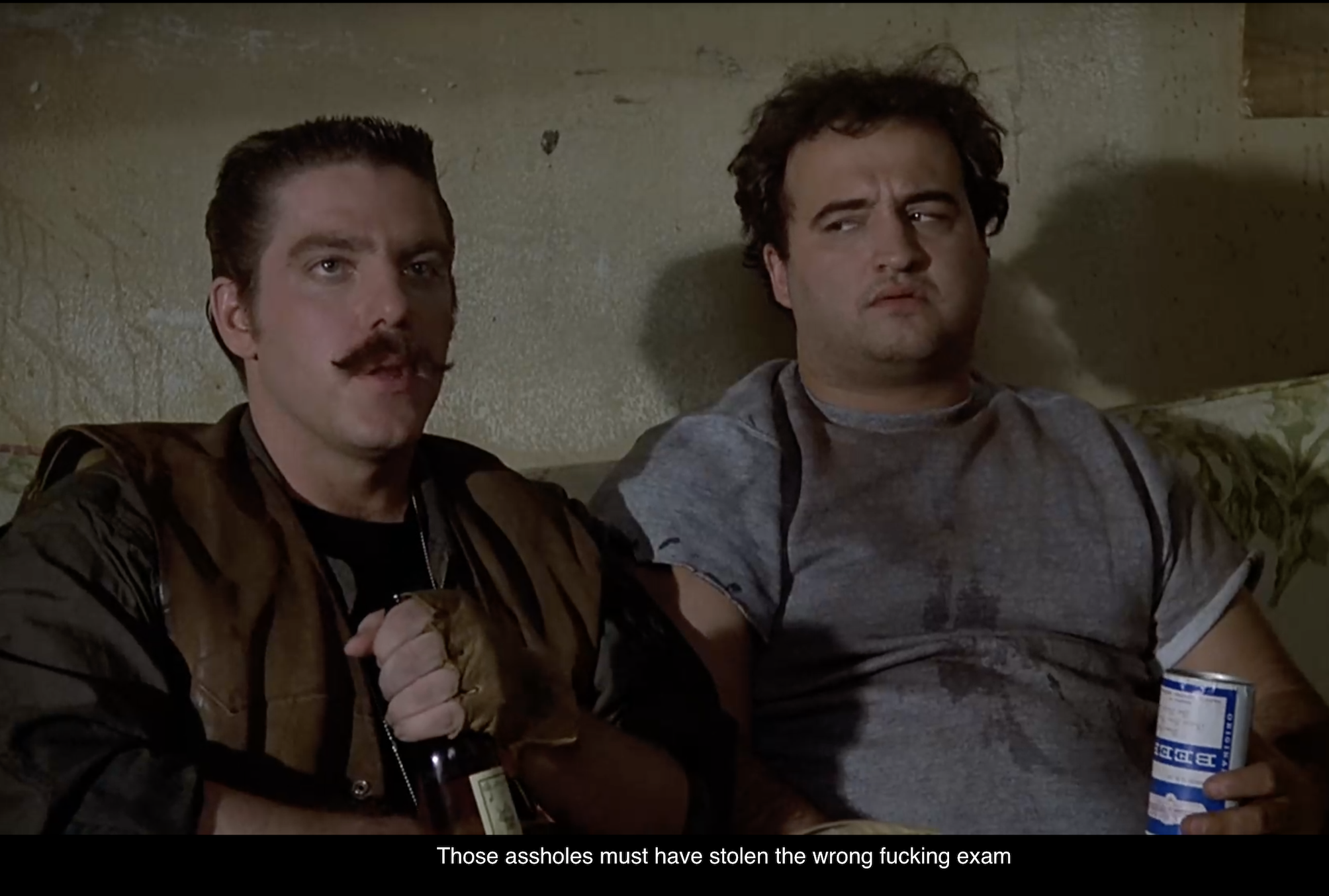 Still from Animal House with John Belushi and the line: "Those assholes must have stolen the wrong fucking exam."
