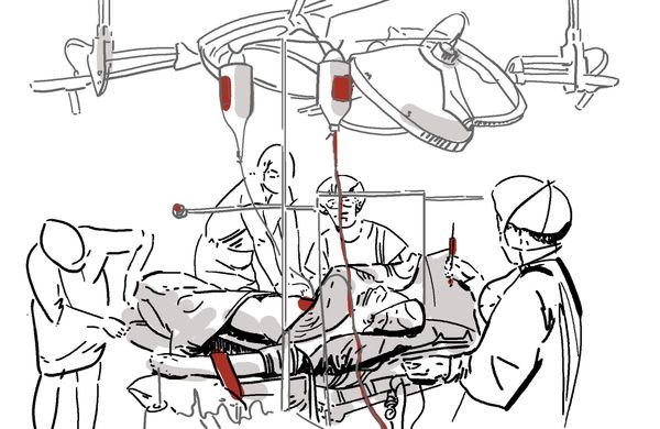 Naz Avó on a surgical bed durrounded by the doctors and nurses