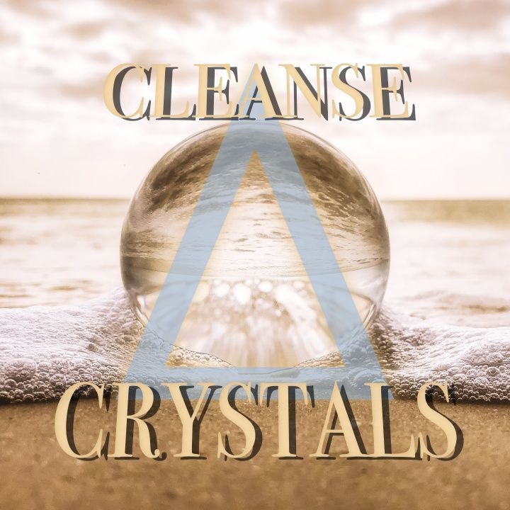 Crystal sphere being washed in the ocean waves