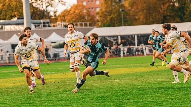 Massy's Tom Cusson evading SC Albi players. Photo Credit: Marceau Ducarne