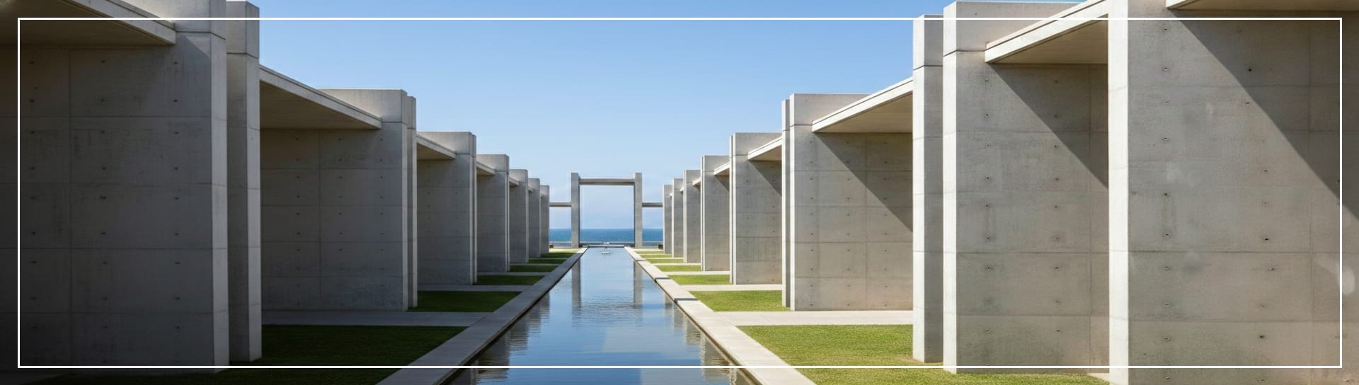 Architectural rendering inspired by the Salk Institute, featuring a symmetrical courtyard and converging lines opening toward the ocean, reflecting MetaChinese Institute’s philosophy of structure enabling discovery.