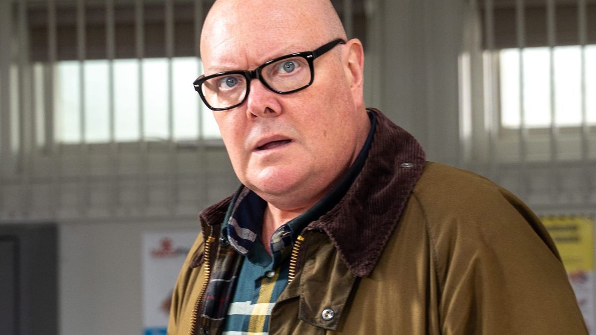 Emmerdale as Paddy discovers a dead body with a knife in its back