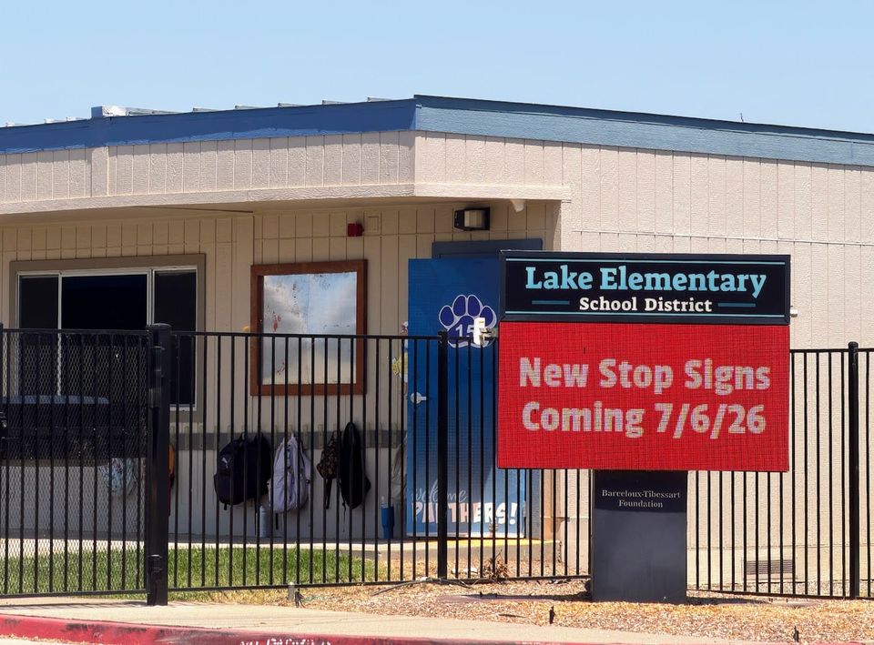 Stop signs coming to Wyo Road intersection near Lake School on July 6