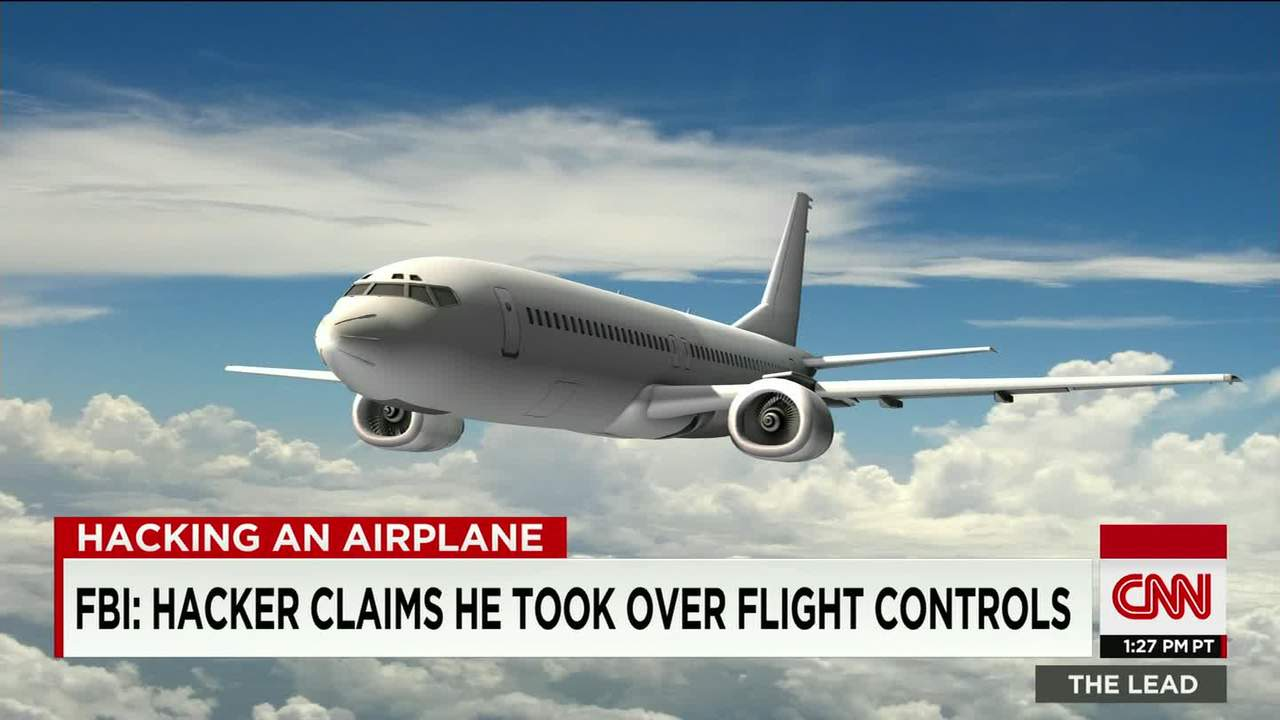 A CNN news graphic shows an airplane flying in a cloudy sky with the headline: “Hacking an Airplane – FBI: Hacker Claims He Took Over Flight Controls.”