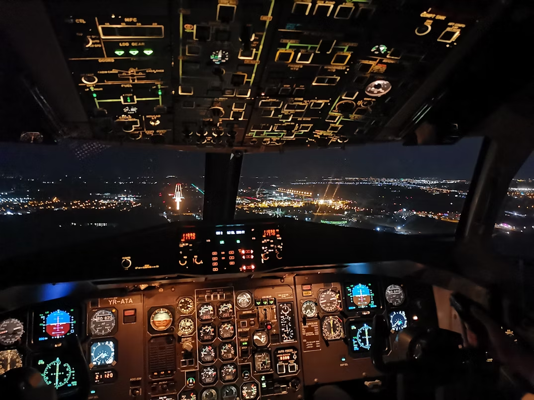 A photo of cockpit at night 